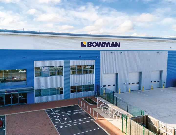 Bowman International engineers inspecting sintered and 3D printed bearing parts